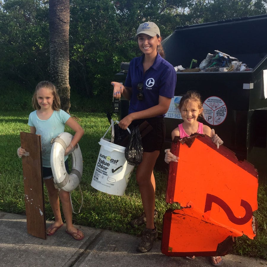 collecting trash and debris at coastal cleanup