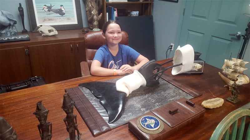 Leya with Winter the dolphin's prosthetic tail