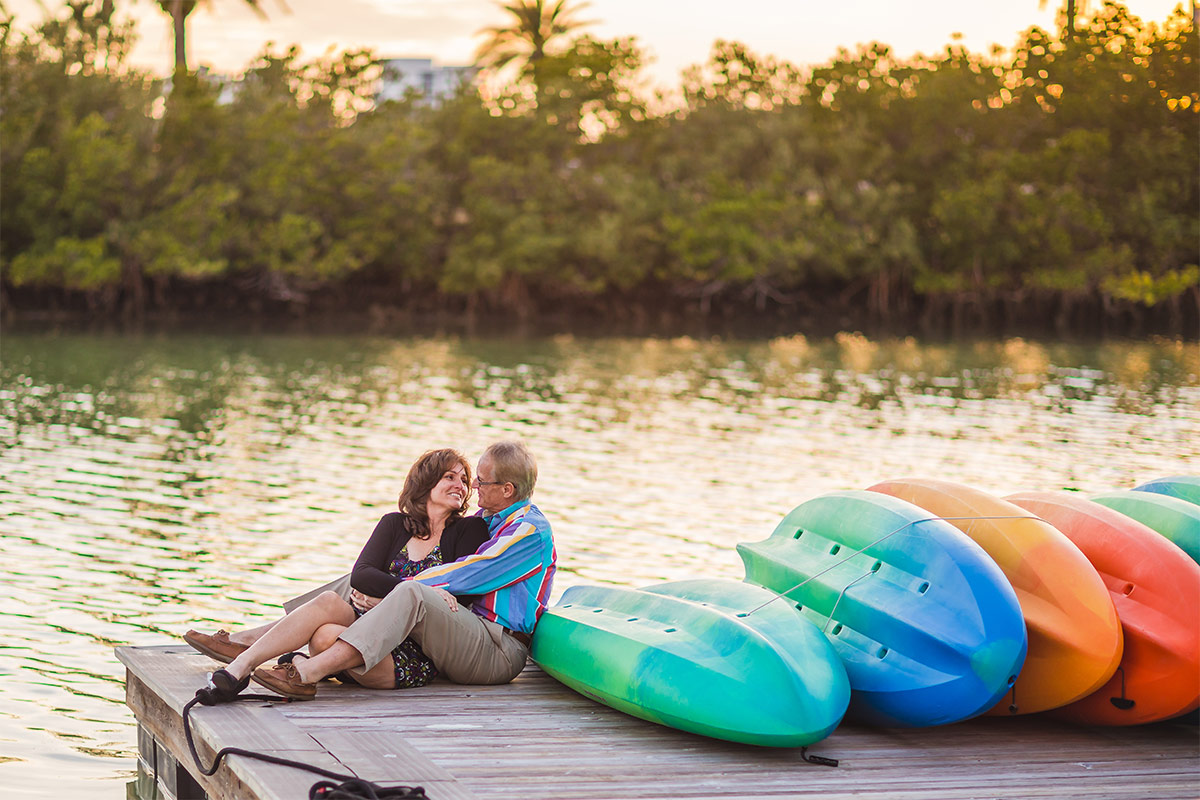 John and mia engagement on deck with kayaks