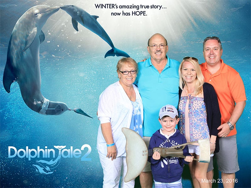 bushman family in front of dolphin tale background