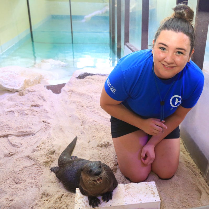 cooper with animal care team