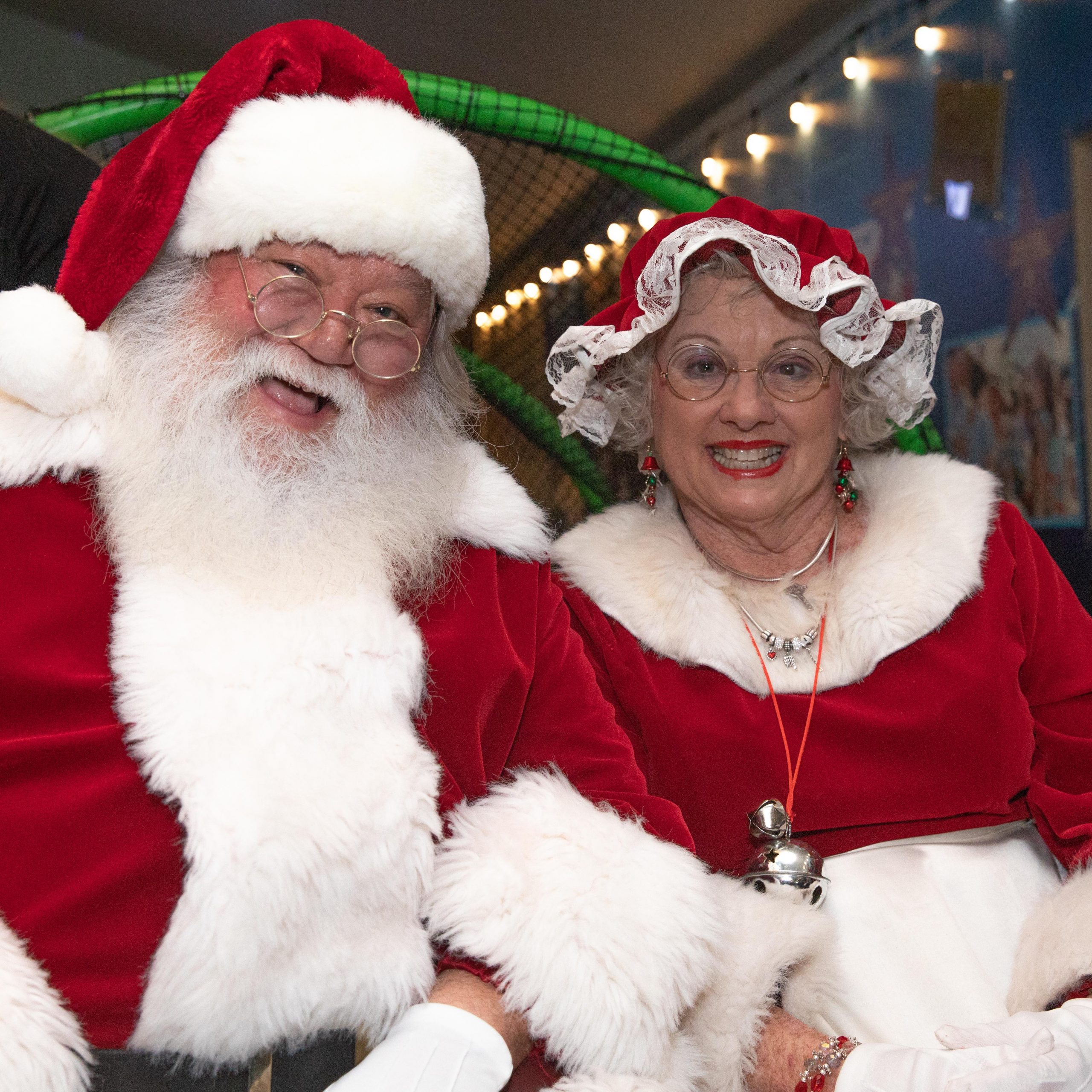 Santa and Mrs. Clause smiling